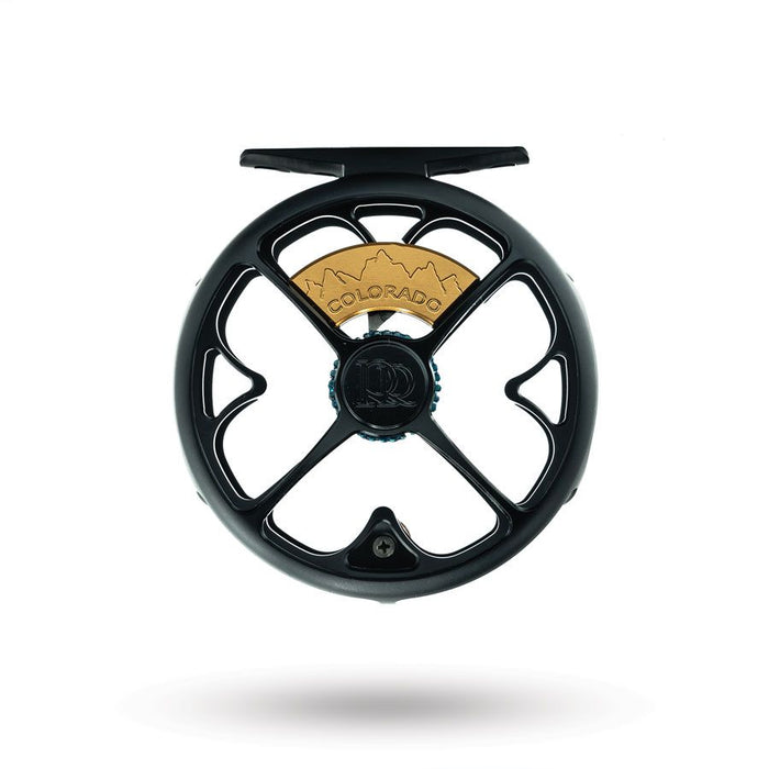 Ross Colorado click-and-pawl fly reel in matte black, machined in Montrose, Colorado, with the San Juan Mountains silhouette on the clicker